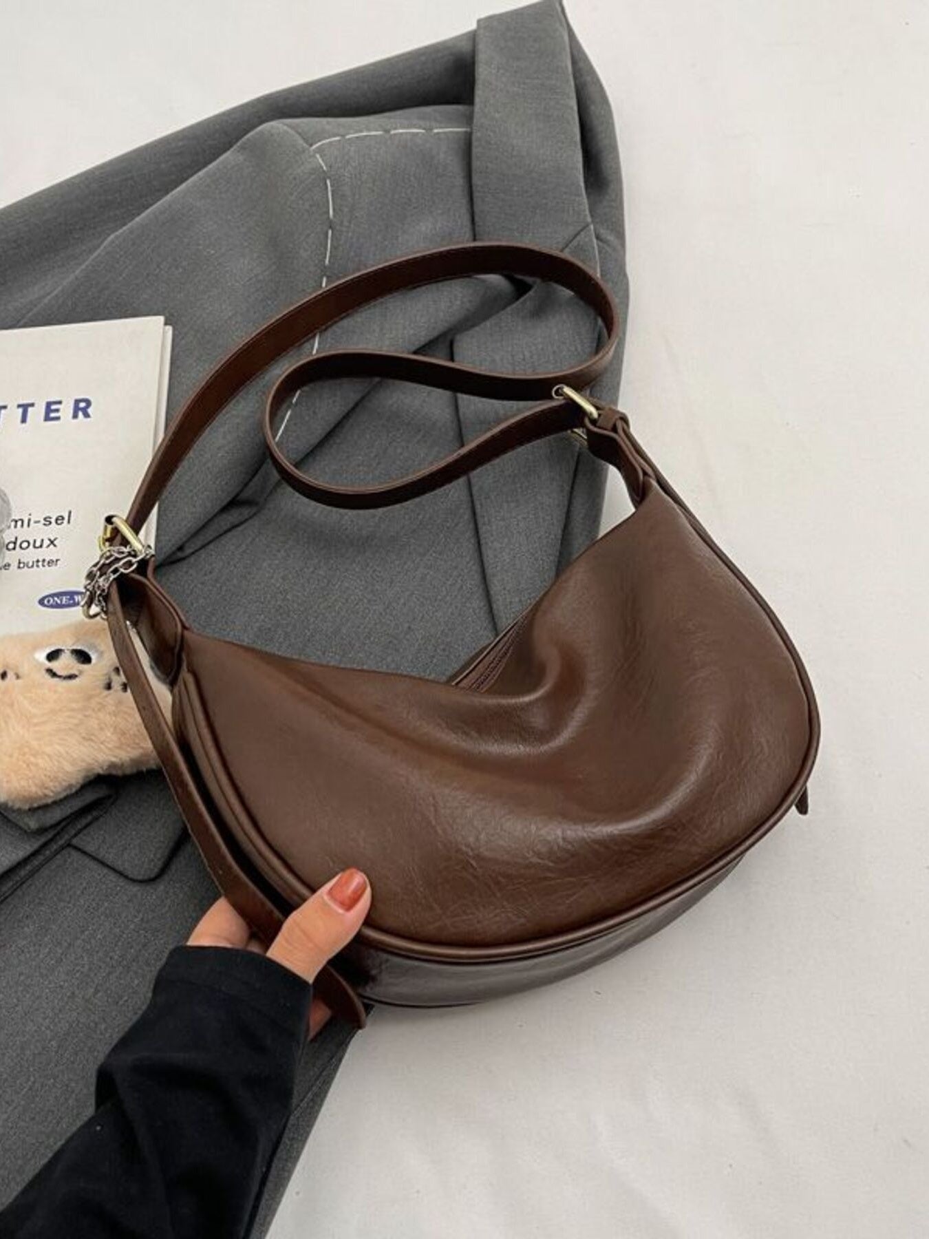 Crescent Shoulder Bag with Plush Charm